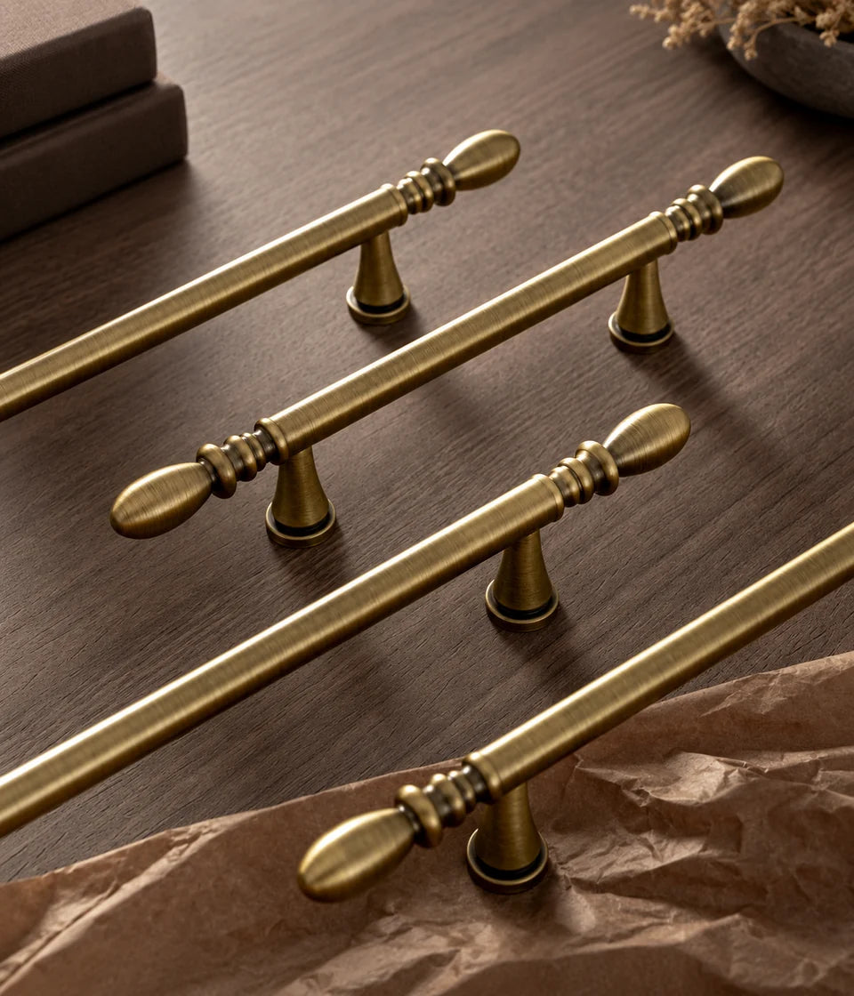 Antique brass water-drop cabinet pull finish and decorative end detail