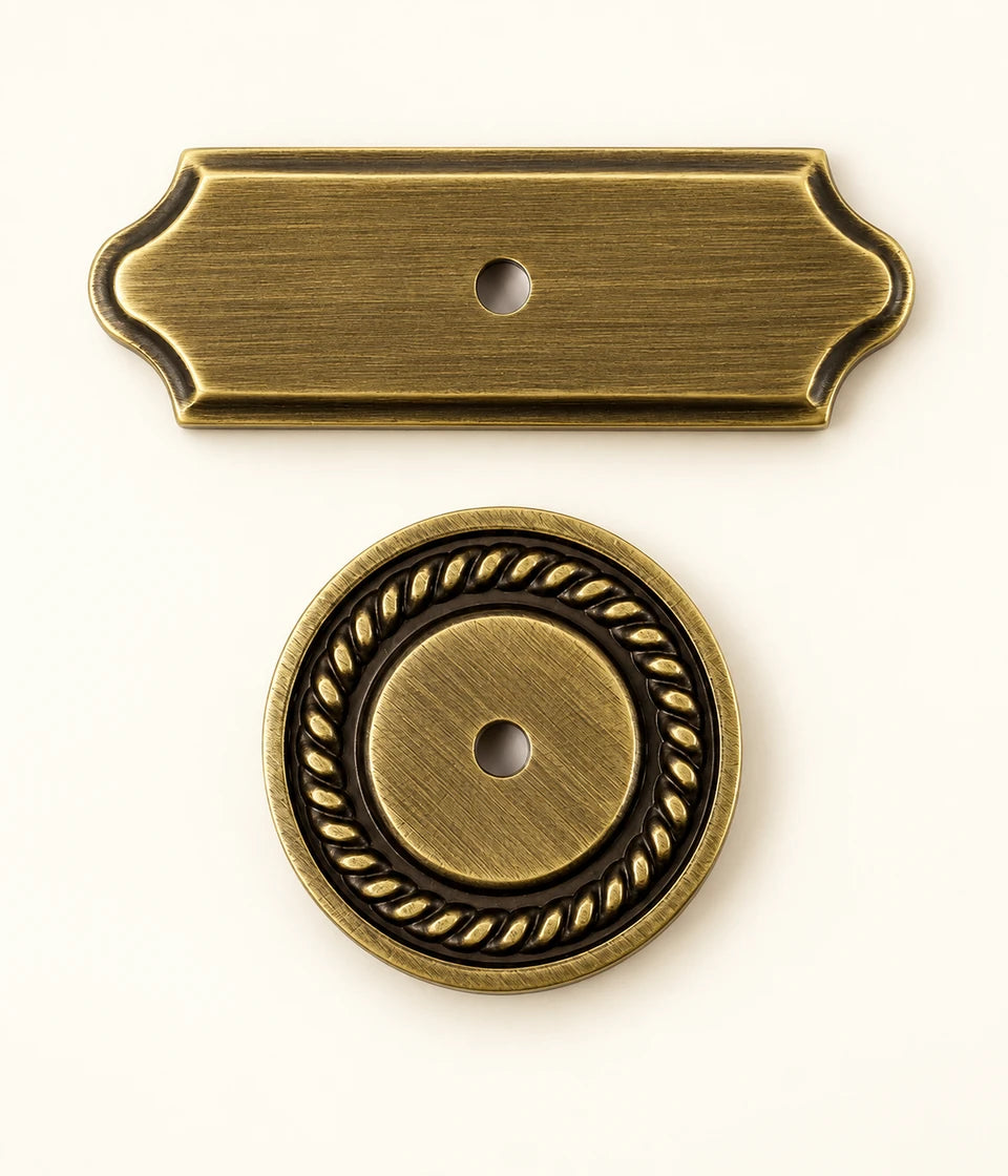 Antique brass scalloped rectangular and rope-edge round cabinet knob backplates
