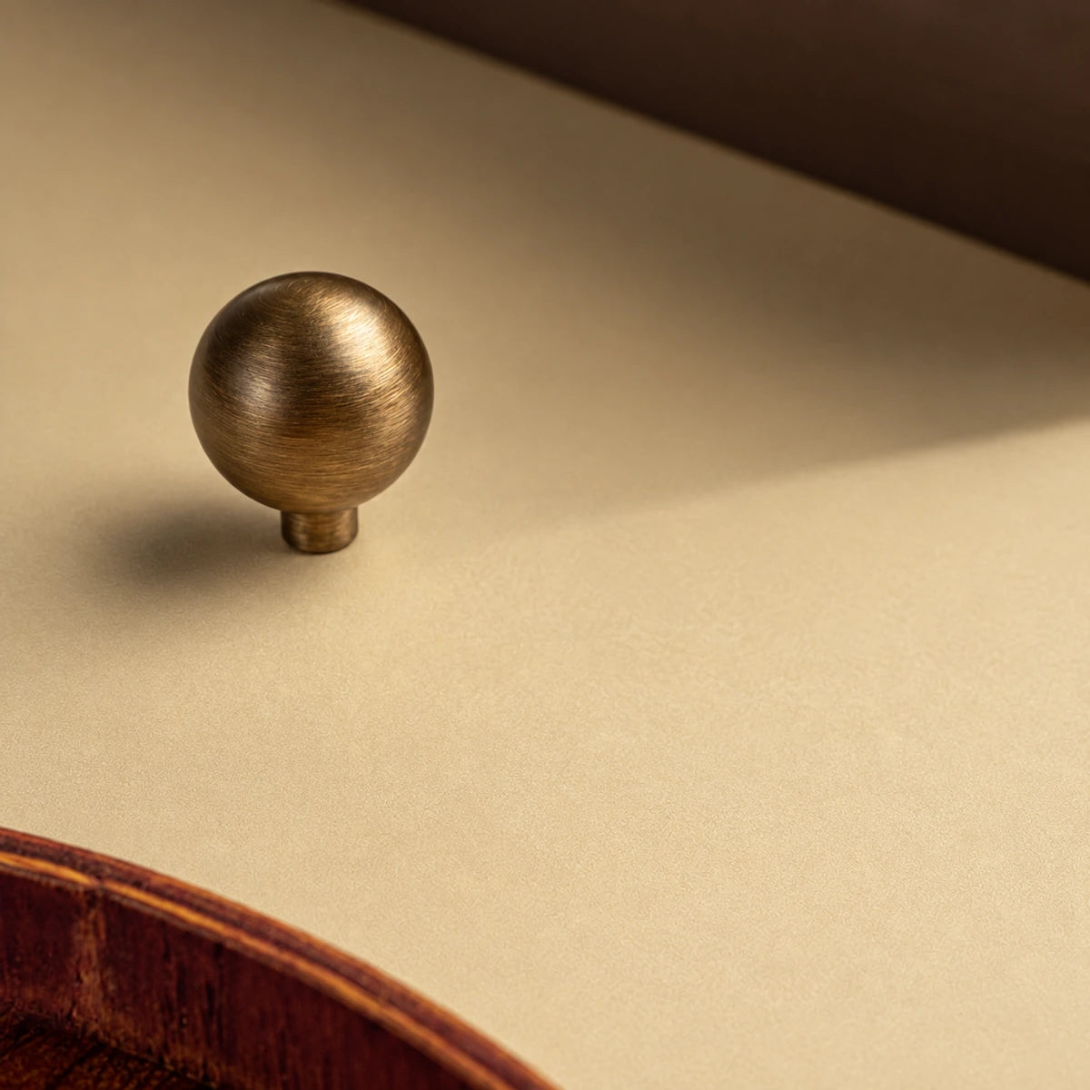 Antique brass round ball knob with a narrow mounting stem