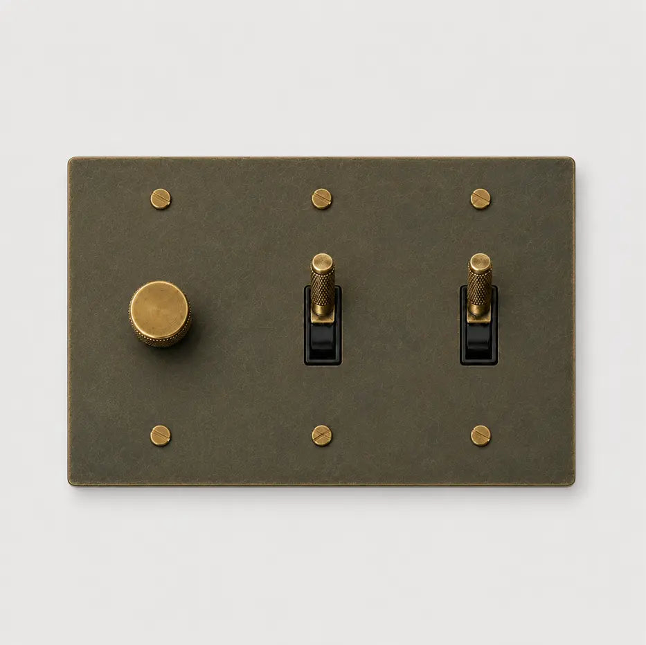 Custom 3 gang aged bronze switch plate with 1 dimmer and 2 toggle switches