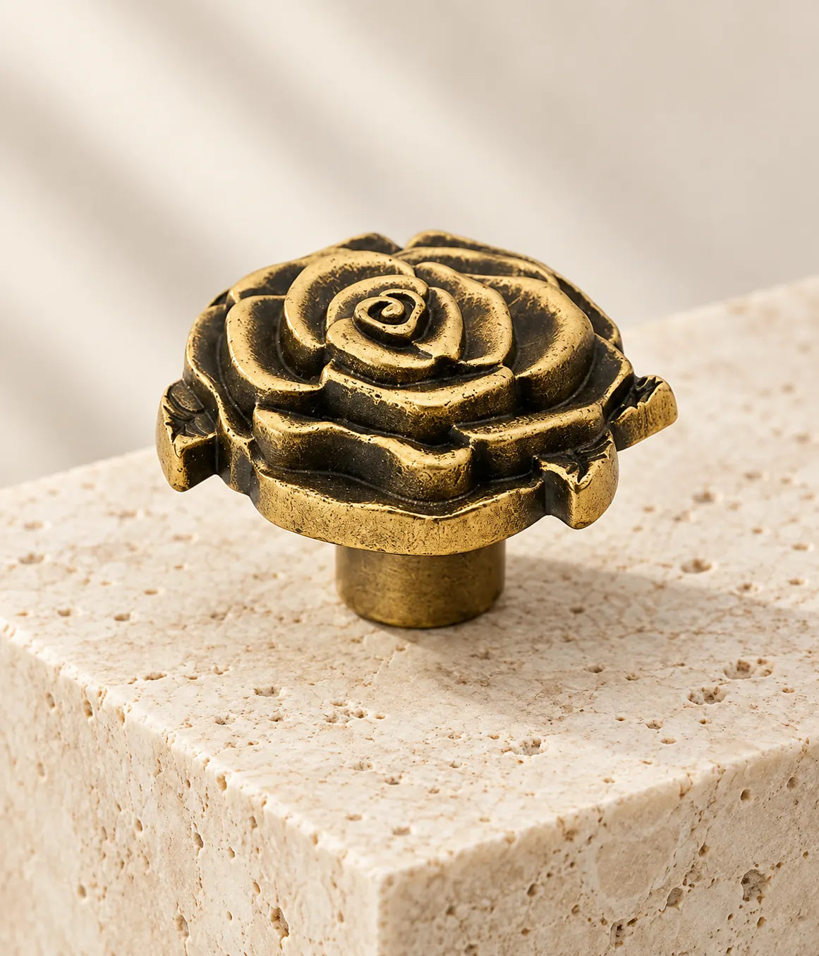 Close-up of raised rose petals and dark antique brass finish