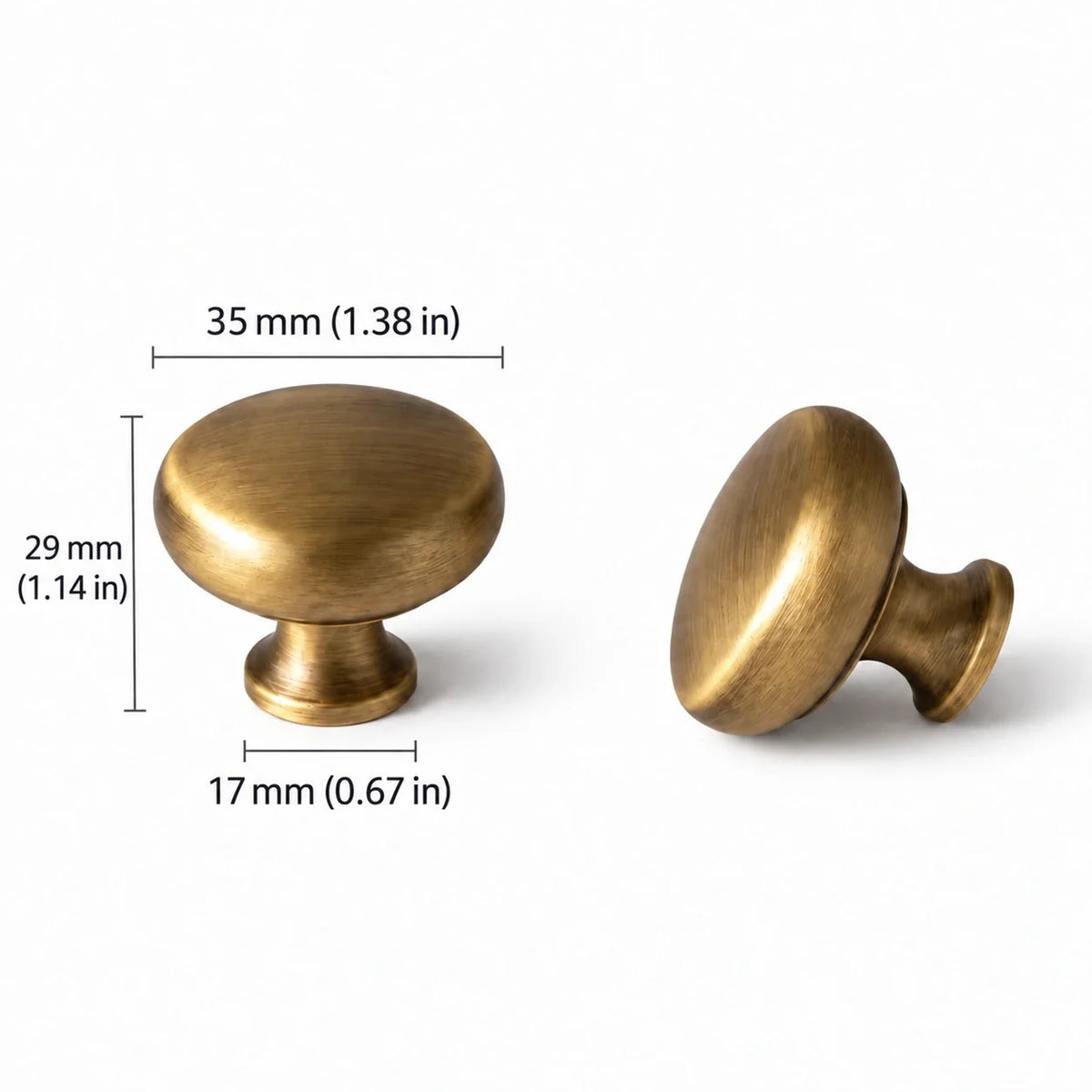 Antique brushed brass round cabinet knob with 35 mm (1.38 in) diameter, 29 mm (1.14 in) projection and 17 mm (0.67 in) base