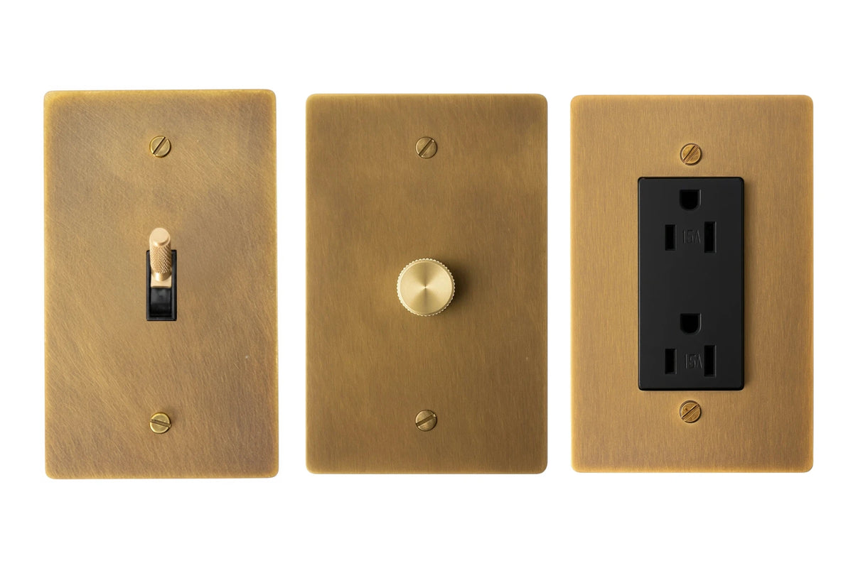 GetSwitches toggle switch, rotary dimmer and duplex outlet sample set in Antique Brass (Hand-Brushed), matching.