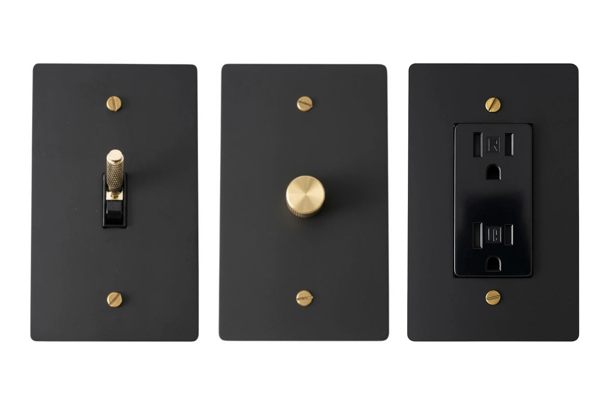 GetSwitches toggle switch, rotary dimmer and duplex outlet sample set in Matte Black, brass accents.