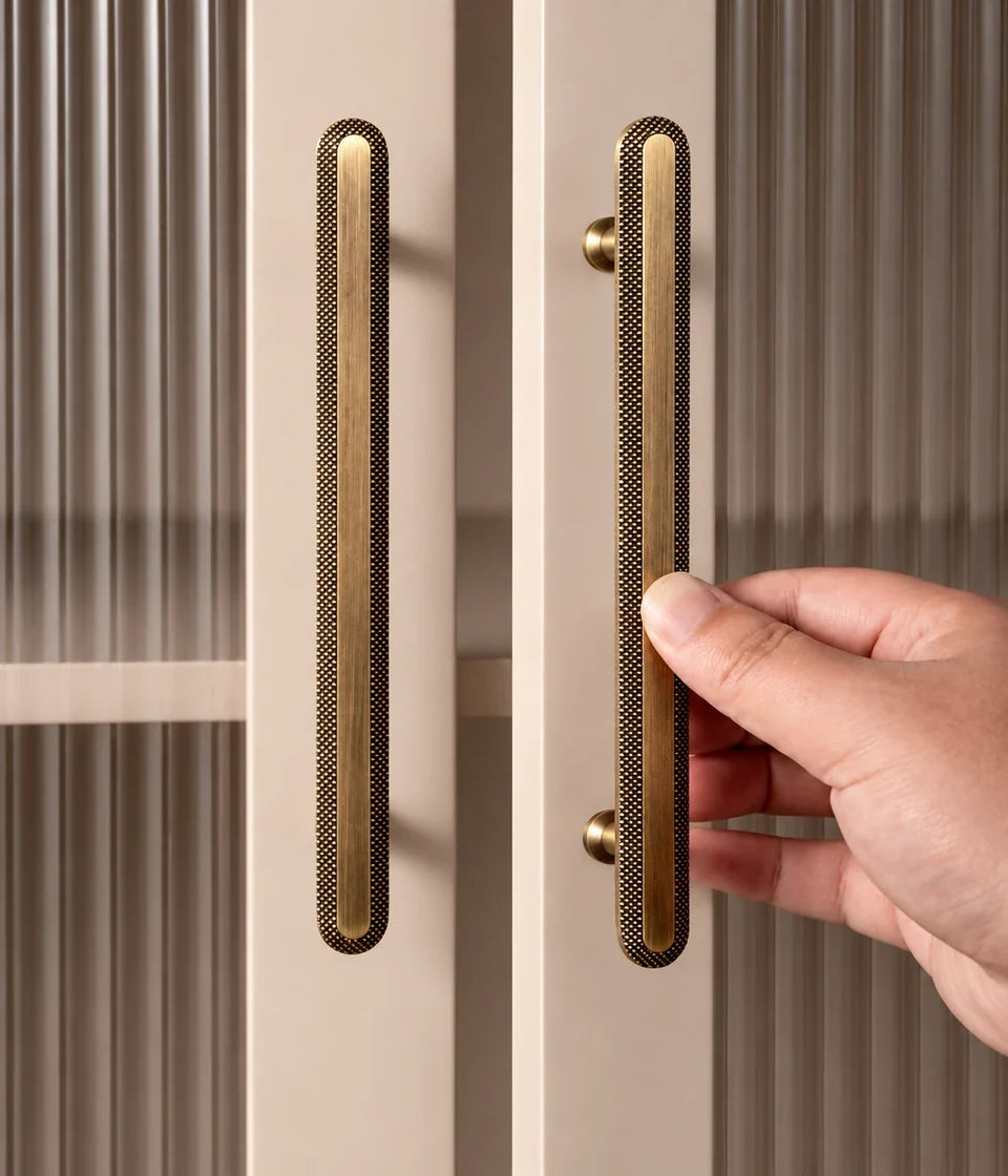 Antique brushed brass cabinet pulls with knurled rims and smooth centers