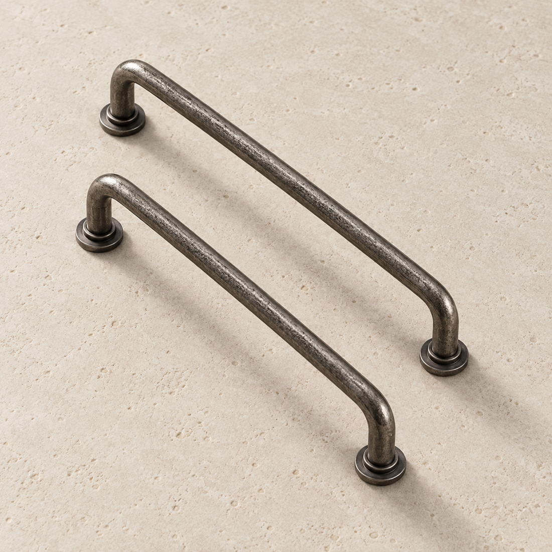 Antique Silver Brass Handle displayed on pale limestone.