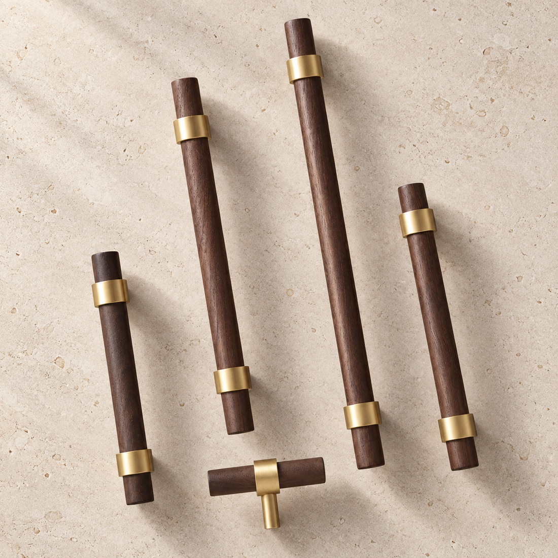 Brass & Wood Handle displayed on pale limestone.