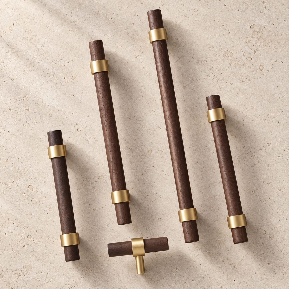 Brass & Wood Handle displayed on pale limestone.