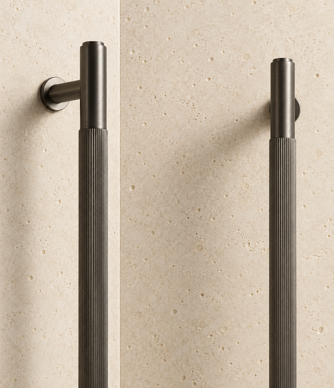 Solid Gunmetal Brass Linear Handle displayed on pale limestone.