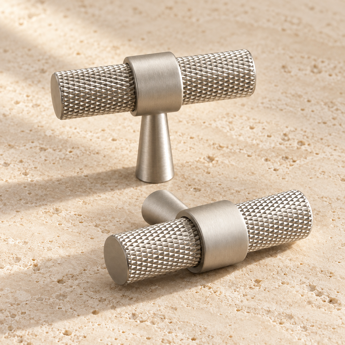 Antique Brass Cabinet Knobs and Door Pulls | Furniture Drawer Handles and T-Bars displayed on pale limestone.