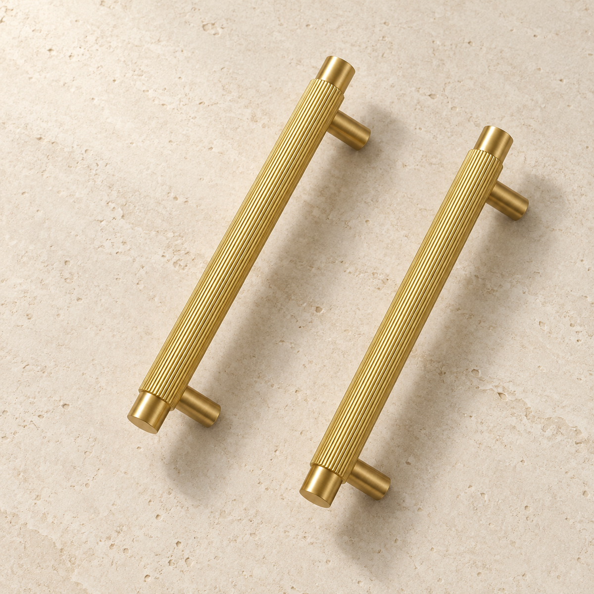 Solid Brass Linear Handle displayed on pale limestone.