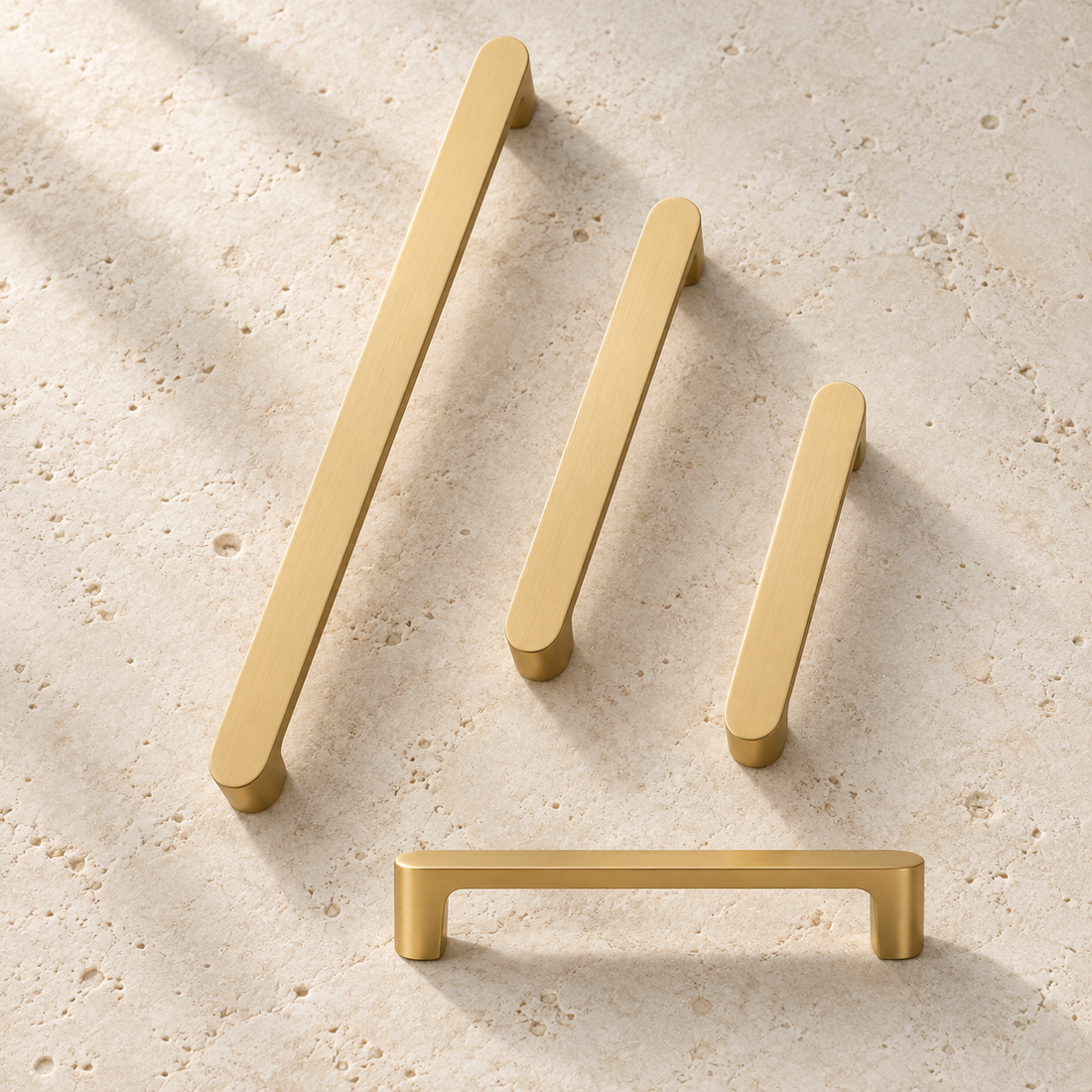 Solid Brass Handle displayed on pale limestone.