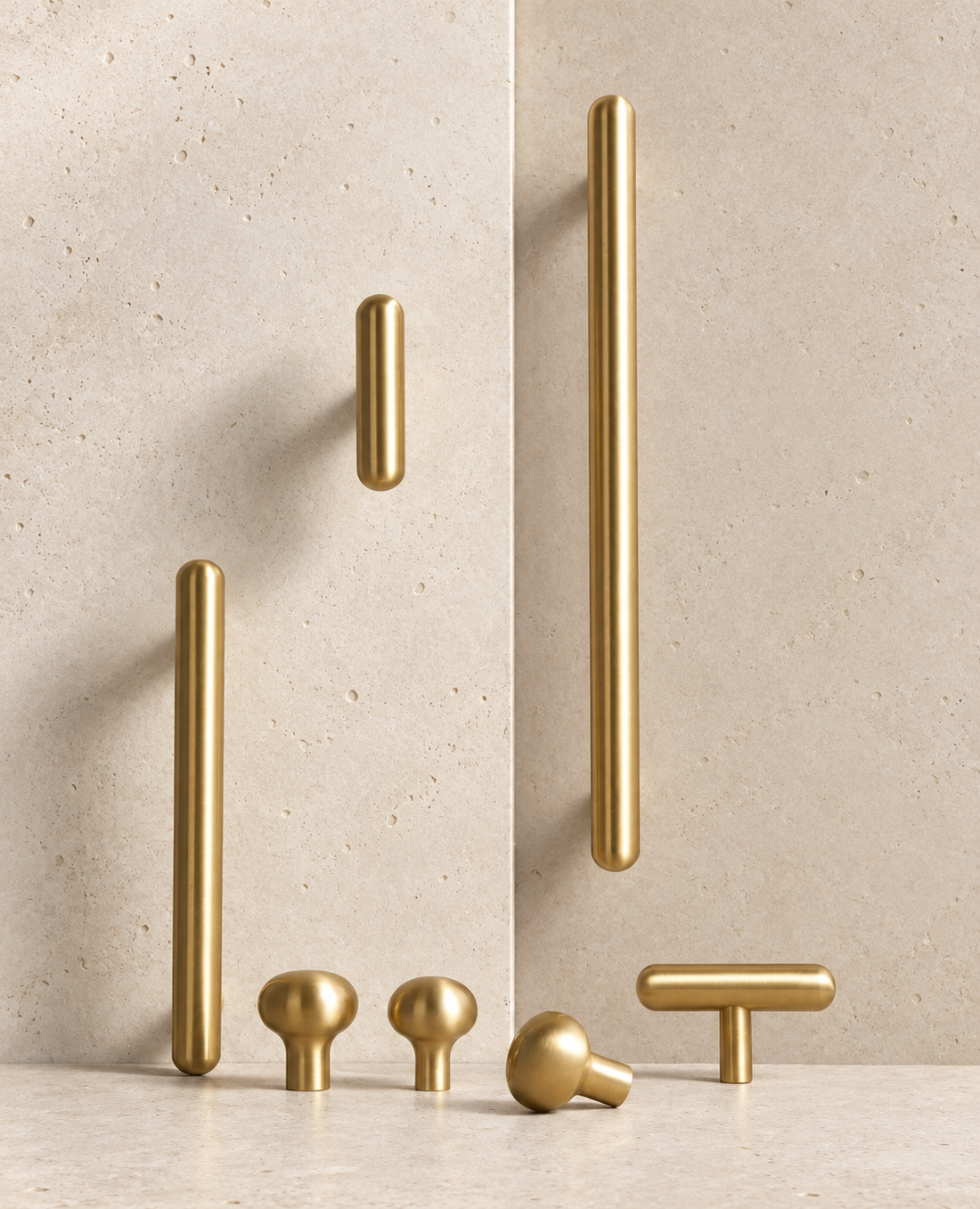 Solid Brass Smooth Round Knob displayed on pale limestone.