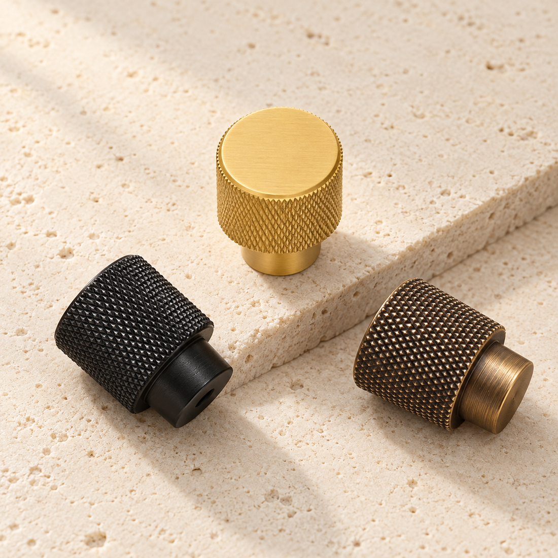 Solid Brass Knurled Cabinet Knob on pale limestone.