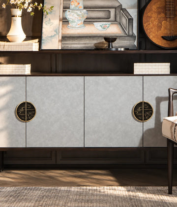 Antique brass cloud medallion pull pairs installed across light cabinet doors