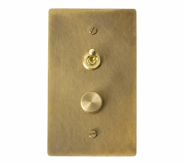 1-gang antique brass (hand-brushed) plate. One smooth brass retro toggle above one 250W single-pole brass rotary dimmer, stacked vertically on a single-gang plate.