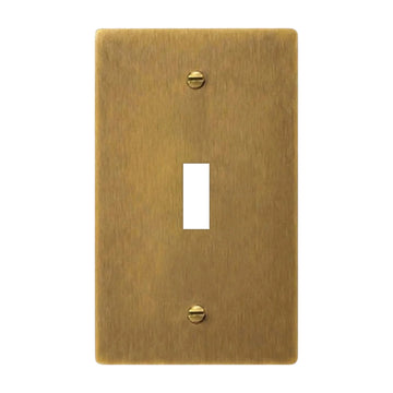 One antique brass (hand-brushed) single-gang faceplate with an empty standard rectangular toggle opening and brass screws. Plate only; no toggle switch is included.