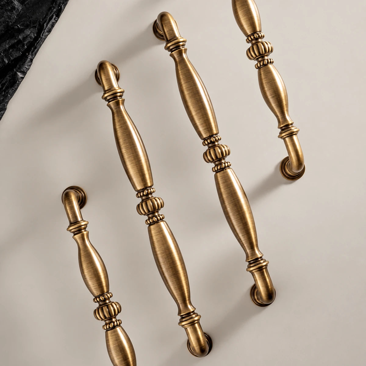 Decorative antique brass bar pulls with ringed collars