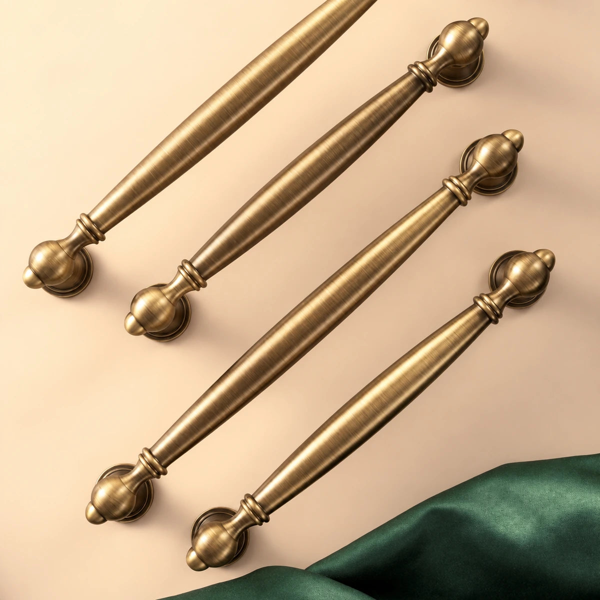 Smooth spindle cabinet pulls showing tapered grips and round bases