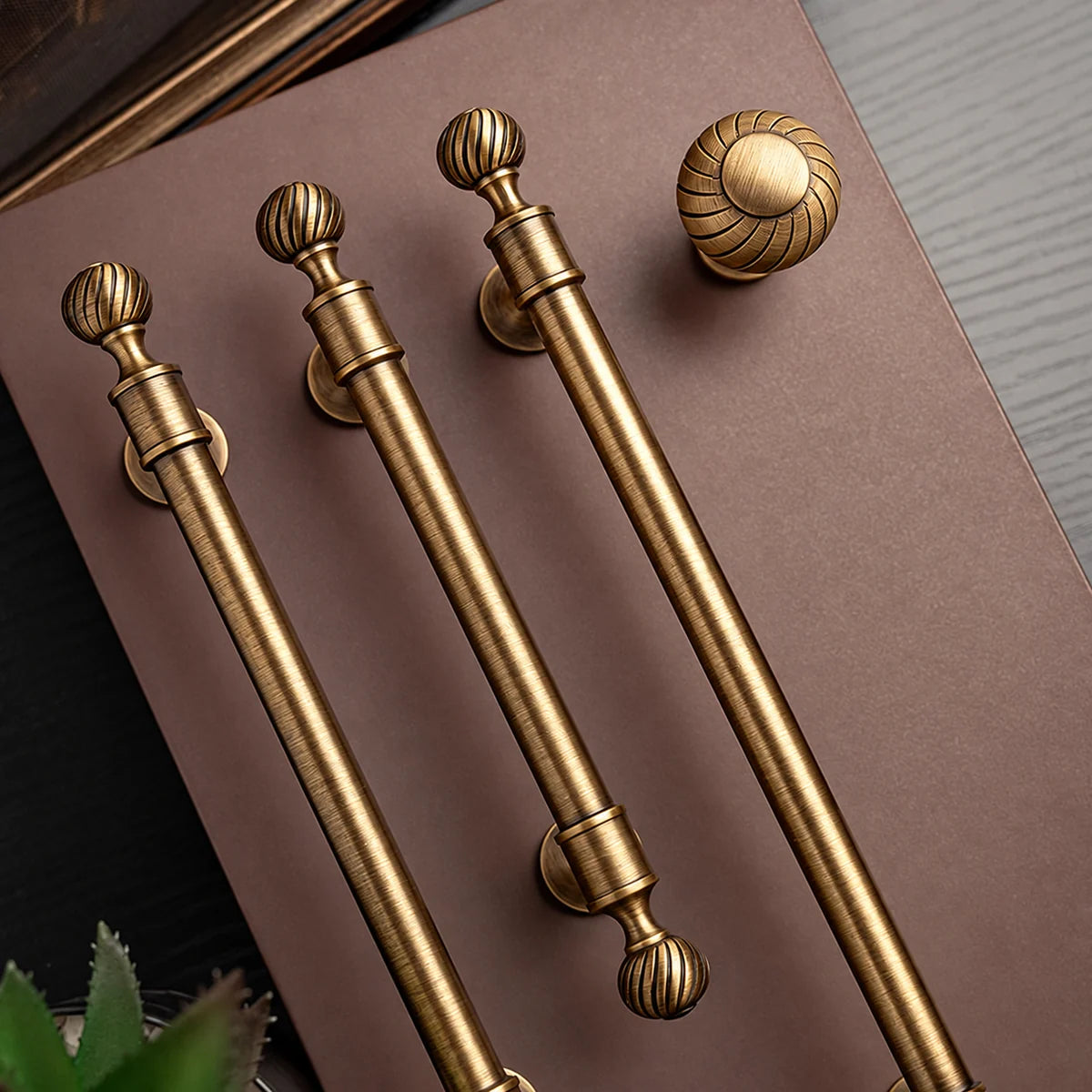 Swirl finial pulls and coordinating knob with supplier branding removed