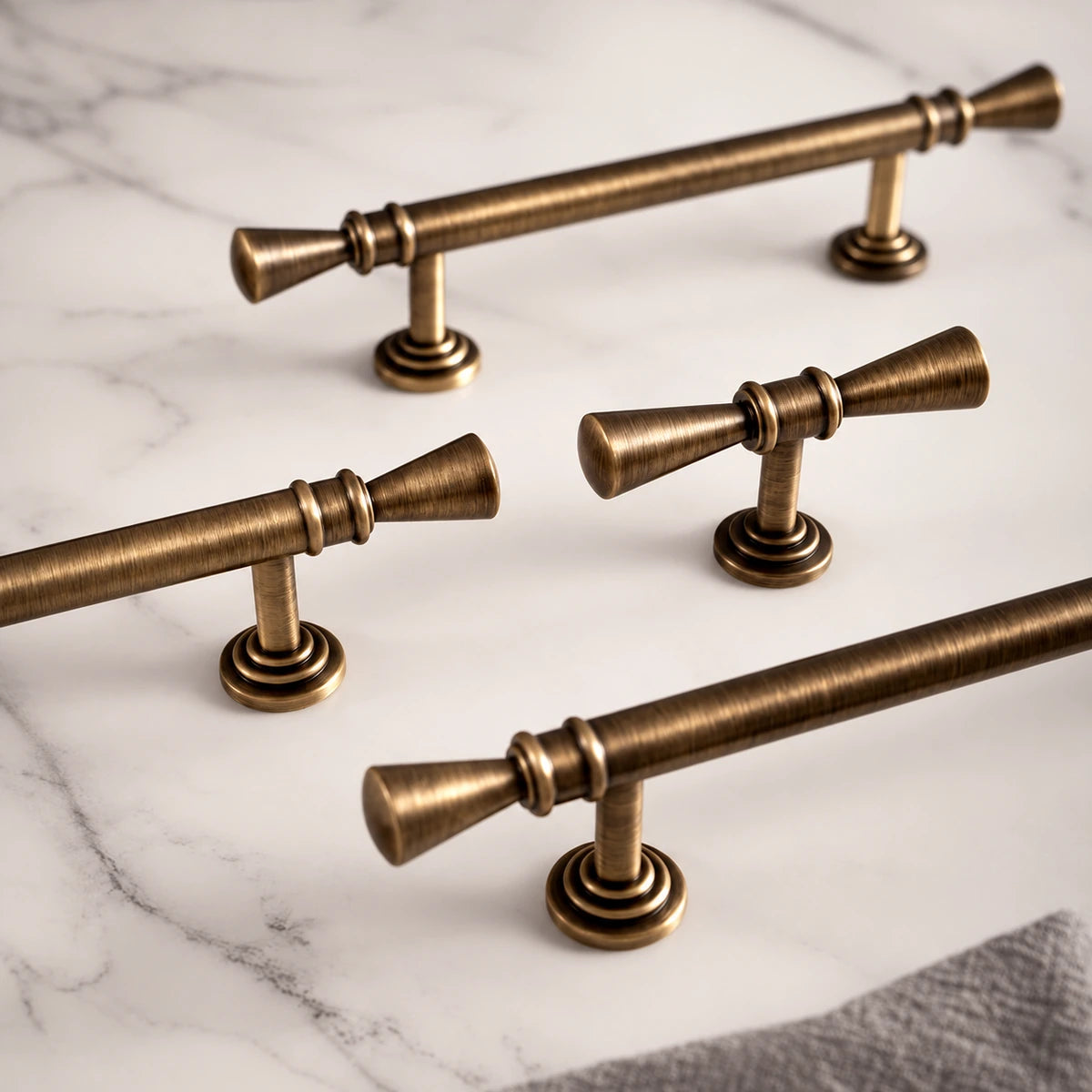 Antique brass trumpet tip pulls and matching T-knob with round mounting bases