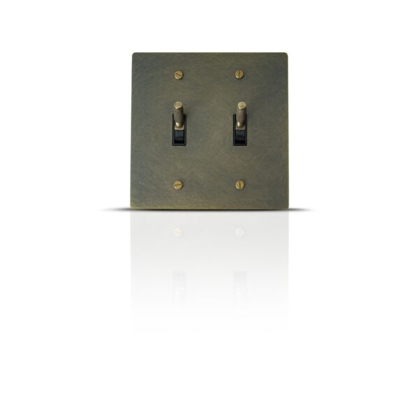 Bronze Brass Panels featuring Stylish Knurled Toggle Switches: Elegant multi-gang switches designed for contemporary interiors.