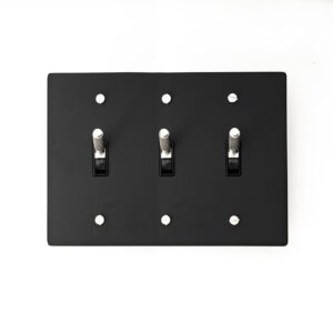 Contemporary 3-Gang Black Brass Plate with Silver Toggle - Sleek and functional triple-gang switch panel, ideal for modern interior settings