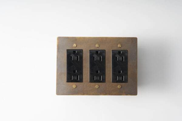 aged brass 3-gang duplex power outlet, a vintage-inspired electrical solution for comprehensive utility in your space