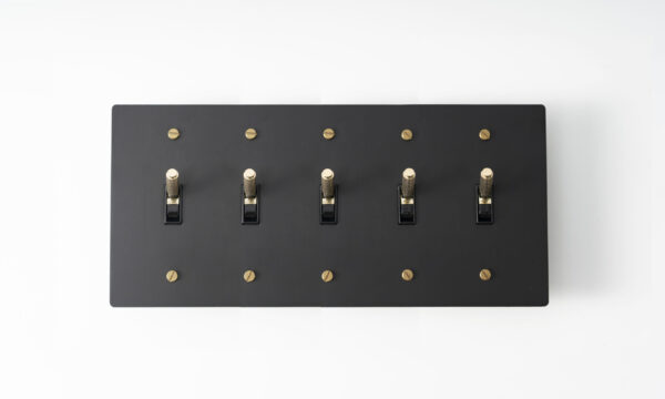 Five-Gang Black Brass Plate with Golden Knurled Toggle Switch - Multiple-toggle switch featuring five controls in a sleek black brass finish, highlighted by golden knurled accents for an elegant look