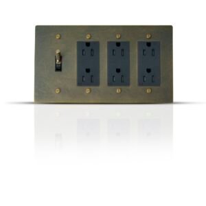 A sleek wall plate featuring a single toggle switch and three Decora style outlets, designed for a modern and efficient electrical setup in a stylish, contemporary interior.