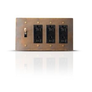 A sleek wall plate featuring a single toggle switch and three Decora style outlets, designed for a modern and efficient electrical setup in a stylish, contemporary interior.