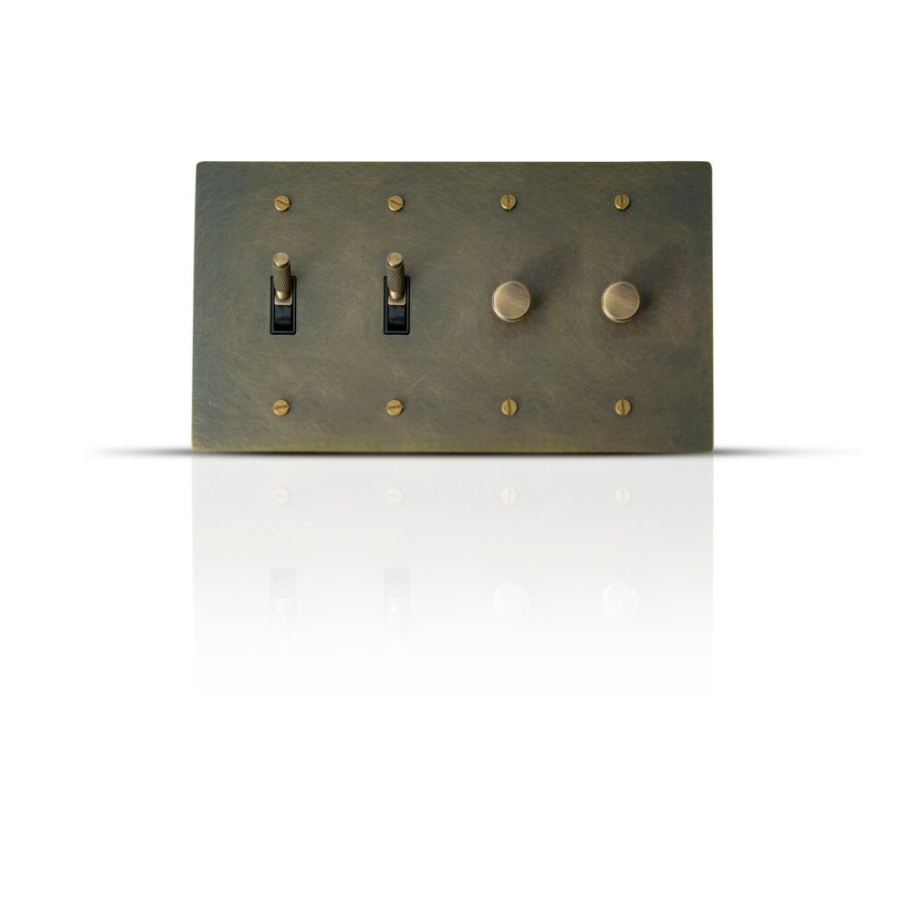 Image of a 2 Toggle Switches and 2 Dimmers Combo Brass Plate, showcasing its design and functionality with a luxurious brass finish.