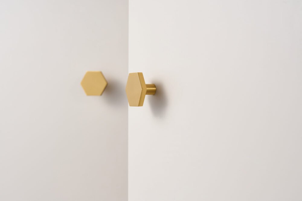 Solid brass hexagon cabinet knob with 1.18-inch width, 0.79-inch height, and 0.39-inch base width - modern geometric design