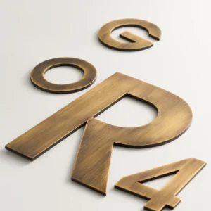 Aged brass letters