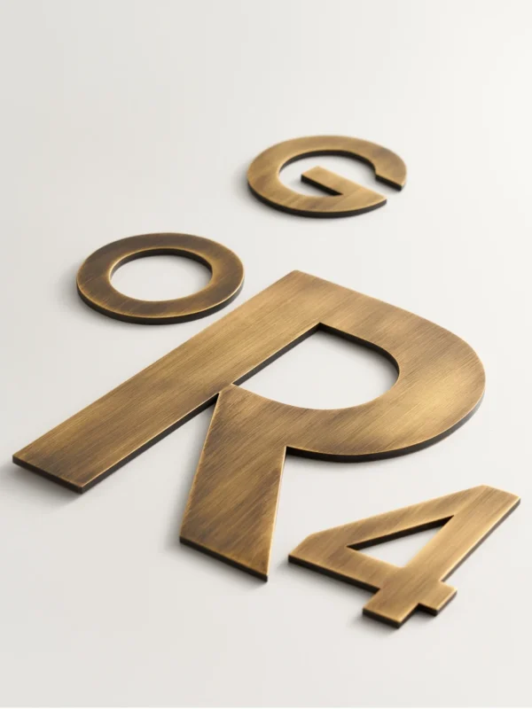 Aged brass letters